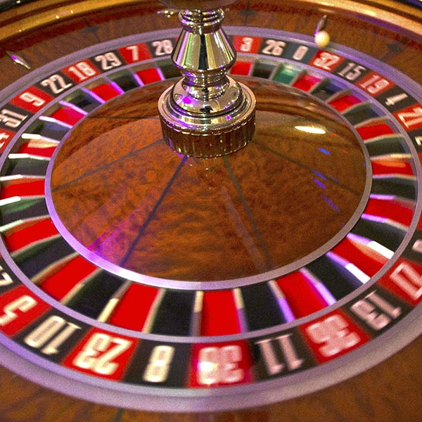 Close up of ball spinning on roulette wheel